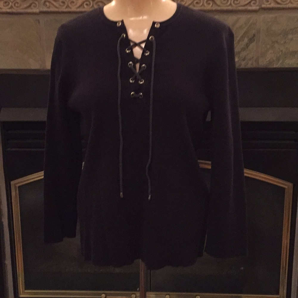 Black lace-up sweater with long sleeves, gold trim